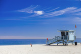 Fototapeta  - Lifeguard station with american flag on Hermosa beach, instagram