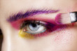 © Paul Collection - Close up on eyes , making colorful eyeshadows and eyeliner