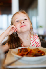 Canvas Print - Little girl eating spaghetti