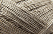 © Tamara Kulikova - lilnen knitting yarn background