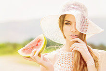 Beautiful Young Woman With Crochet Hat And Watermelon Slice