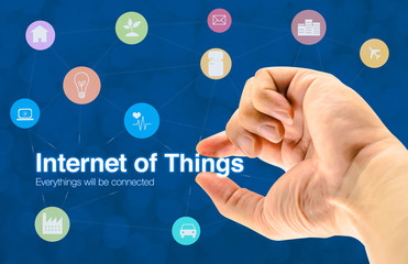 hand holding internet of things (iot) word and object icon and b