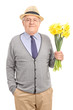 © Ljupco Smokovski - Romantic senior gentleman holding flowers