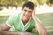 © Monkey Business - Teenage Boy Relaxing In Park