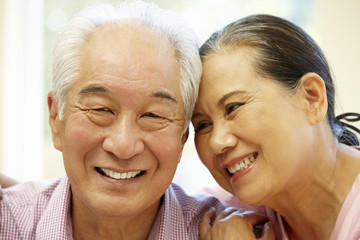 Wall Mural - Senior Asian couple at home