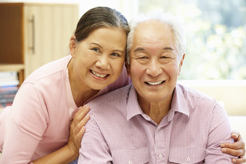 Wall Mural - Senior Asian couple at home