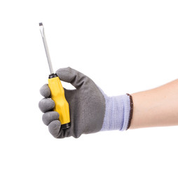 Hand holding a yellow screwdriver. 