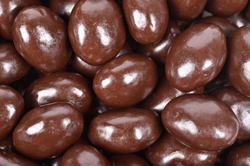 Wall Mural - Dark brown dragee, chocolate covered nuts