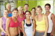 © Monkey Business - Portrait Of Group Of Gym Members In Fitness Class