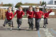 © Monkey Business - Elementary School Pupils Running In Playground