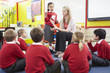 © Monkey Business - Teacher Teaching Maths To Elementary School Pupils