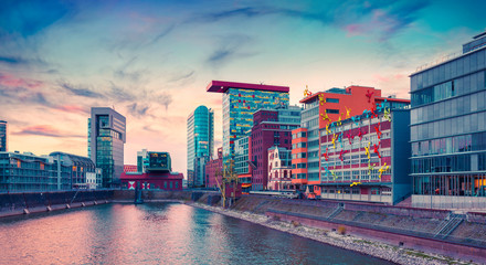 Wall Mural - Colorful view of Rhine river at evening in Dusseldorf