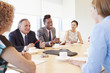 © Monkey Business - Five Businesspeople Having Meeting In Boardroom