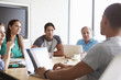 © Monkey Business - Five Businesspeople Having Meeting In Boardroom