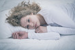 © Photographee.eu - Despair girl lying in bed