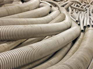 Flexible metal hose in a warehouse.