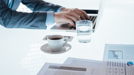 Wall Mural - Businessman working at desk