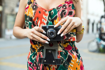 Girl Holding Camera