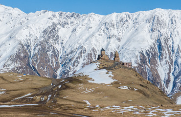 Poster - 14th century Holy Trinity Church (Tsminda Sameba) near Mount Kazbek in Georgia