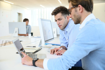 Wall Mural - Businessmen in work meeting with laptop computer