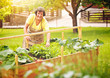 canvas print picture - elderly woman with vegetables in her garden-gardening 01