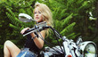 © Alona - Stylized photo of woman and bike