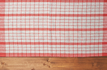 Wall Mural - Tablecloth or towel over the wooden table