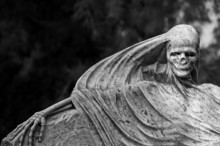 Beautiful, Spooky Cemetery Sculpture Depicting Death.