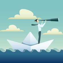 Businessman Is Sailing On Paper Boat In Ocean