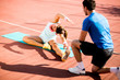 © BGStock72 - Woman training with personal trainer