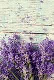 Fototapeta Lawenda - Fresh lavender on wood