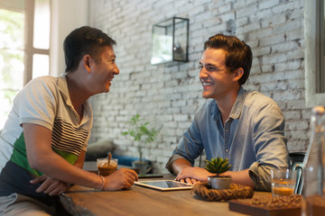 Two Men Sitting at Cafe, Asian Mix Race Friends Guys 