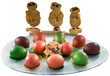 Traditional Greek cookies “Lazarakia” with Easter colored eggs.