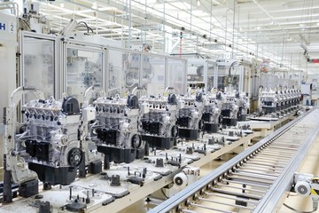 production assembly line for manufacturing of the engines in the car factory. car factory. car parts