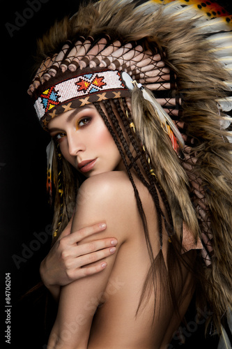 Naklejka na kafelki Beautiful ethnic lady with roach on her head.