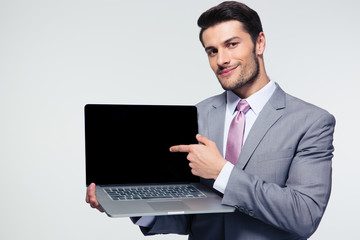 Poster - businessman pointing finger on the laptop screen