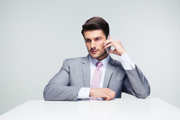 Poster - Confident businessman talking on the phone