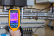 Thermal imaging inspection of heat system with tubes at house