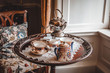 Beautiful medieval tea set with silver teapot.
