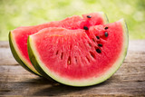 Watermelon slices on the wooden table 