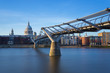 St Paul's Cathedral and Millennium Bridge in sunset, London, UK