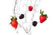 Strawberries and Blackberries Splashing Through Water