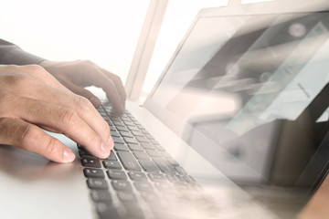 close up of business man hand working on laptop computer with so