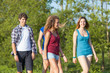 © william87 - Group of Teenage Friends Walking at Park