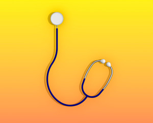 Stethoscope on isolated yellow orange background