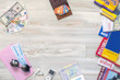 © alexbrylovhk - Travel destinations. Conceptual background for travel topic. Rough wooden desk from above passport, foreign cash notes, cards and maps
