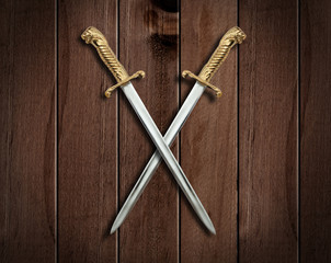 Two Swords on a wooden Wall.