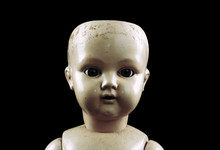 Vintage Doll Face Isolated On Black With Clipping Path