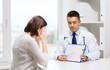 © Syda Productions - doctor and young woman meeting at hospital