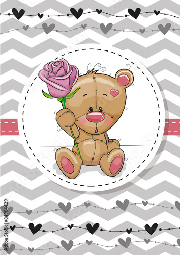 Fototapeta na wymiar Bear with a flower